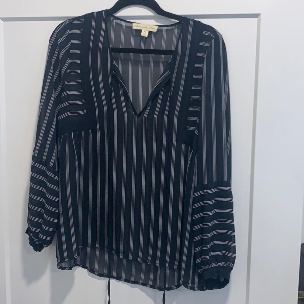 Blue sheer v neck top with white strips